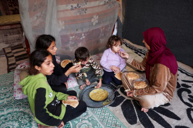 Gaza mother struggling to feed children says only death can end their suffering